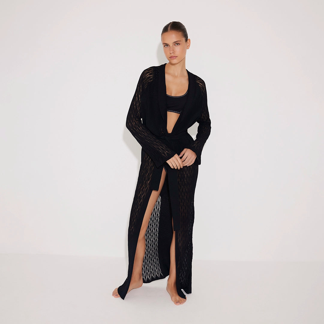 Chad Long Sleeve Belted Knitted Mesh Black Kaftan | Moeva | Kaftans | Each week unveils new pieces—luxury swimwear, fluid resort silhouettes, and elevated summer-to-evening essentials designed to carry you from coastal escapes to city nights.