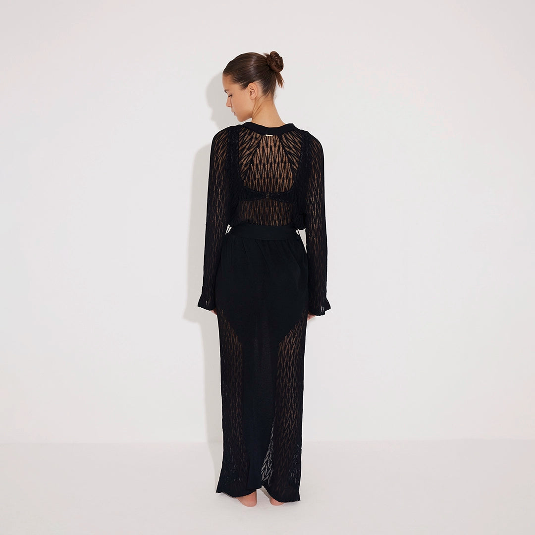 Chad Long Sleeve Belted Knitted Mesh Black Kaftan | Moeva | Kaftans | Each week unveils new pieces—luxury swimwear, fluid resort silhouettes, and elevated summer-to-evening essentials designed to carry you from coastal escapes to city nights.