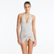 Clementine Silver Halterneck Swimsuit with Tie-Front Skirt Detail | Moeva | Swimsuit | Each week unveils new pieces—luxury swimwear, fluid resort silhouettes, and elevated summer-to-evening essentials designed to carry you from coastal escapes to city nights.
