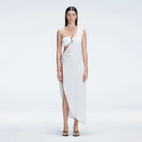 Coraline White One Shoulder Asymetrical Maxi Dress | Moeva | Beachwear Dresses | Each week unveils new pieces—luxury swimwear, fluid resort silhouettes, and elevated summer-to-evening essentials designed to carry you from coastal escapes to city nights.