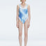 Front view of model wearing Calista Blue Optical Swimsuit with scoop neck and two-layered tulle design.
