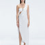 Front view of model wearing Coraline White Dress with chic one-shoulder design and trendy buckle detail.
