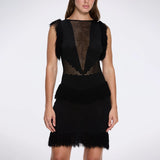 Diani Black Fringe Detail Sheer Panel Open Back Mini Dress | Moeva | RTW Dresses | Each week unveils new pieces—luxury swimwear, fluid resort silhouettes, and elevated summer-to-evening essentials designed to carry you from coastal escapes to city nights.