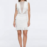 Diani White Fringe Detail Sheer Panel Open Back Mini Dress | Moeva | RTW Dresses | Each week unveils new pieces—luxury swimwear, fluid resort silhouettes, and elevated summer-to-evening essentials designed to carry you from coastal escapes to city nights.