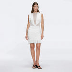 Diani White Fringe Detail Sheer Panel Open Back Mini Dress | Moeva | RTW Dresses | Each week unveils new pieces—luxury swimwear, fluid resort silhouettes, and elevated summer-to-evening essentials designed to carry you from coastal escapes to city nights.