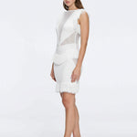 Diani White Fringe Detail Sheer Panel Open Back Mini Dress | Moeva | RTW Dresses | Each week unveils new pieces—luxury swimwear, fluid resort silhouettes, and elevated summer-to-evening essentials designed to carry you from coastal escapes to city nights.