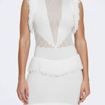 Diani White Fringe Detail Sheer Panel Open Back Mini Dress | Moeva | RTW Dresses | Each week unveils new pieces—luxury swimwear, fluid resort silhouettes, and elevated summer-to-evening essentials designed to carry you from coastal escapes to city nights.