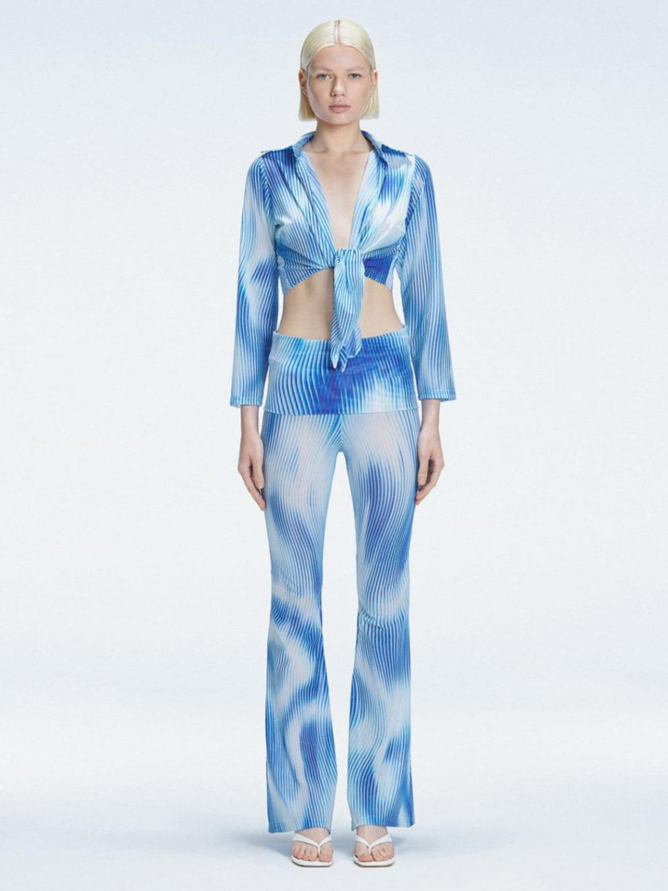 Greta Blue Long Sleeve Tie Front Shirt | Moeva | Shirt | Each week unveils new pieces—luxury swimwear, fluid resort silhouettes, and elevated summer-to-evening essentials designed to carry you from coastal escapes to city nights.