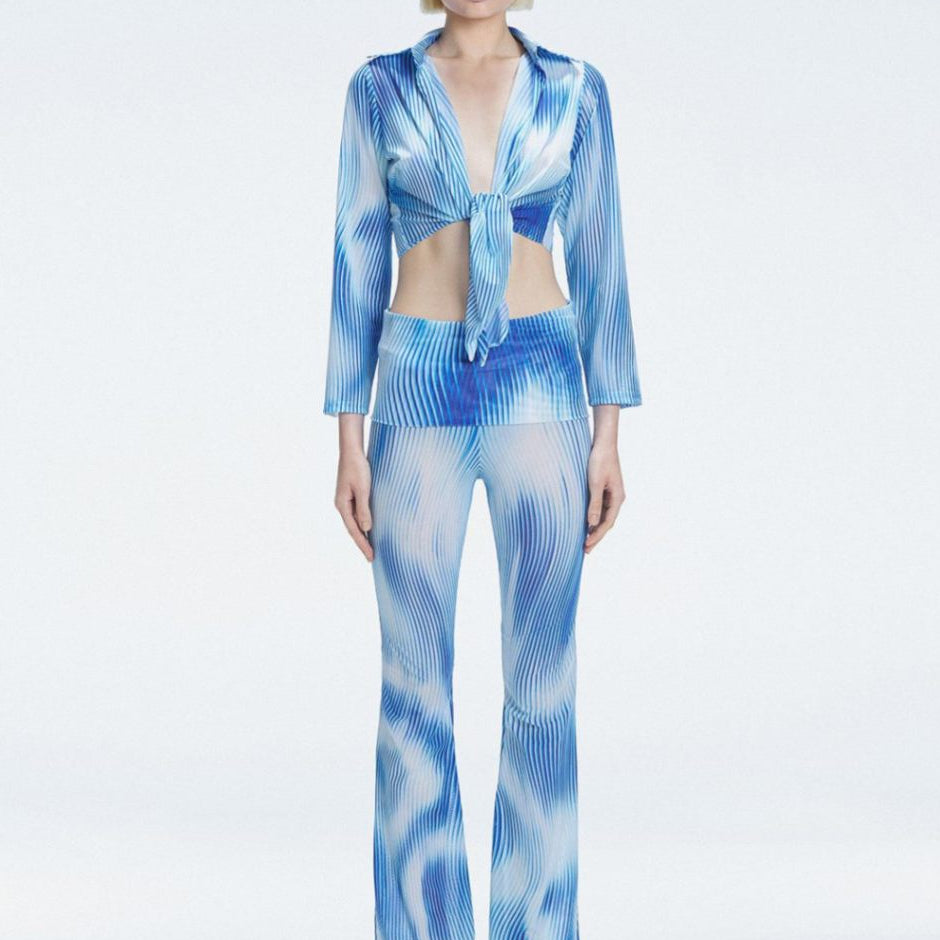 Greta Blue Long Sleeve Tie Front Shirt | Moeva | Shirt | Each week unveils new pieces—luxury swimwear, fluid resort silhouettes, and elevated summer-to-evening essentials designed to carry you from coastal escapes to city nights.