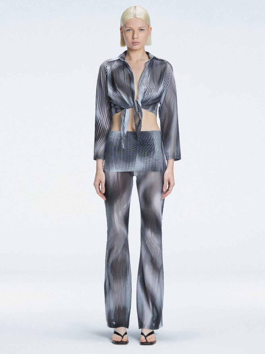Greta Black Long Sleeve Tie Front Shirt | Moeva | Shirt | Each week unveils new pieces—luxury swimwear, fluid resort silhouettes, and elevated summer-to-evening essentials designed to carry you from coastal escapes to city nights.