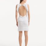 "Detailed view of the Diani White Dress's back, highlighting the delicate gold clasps and low back design."