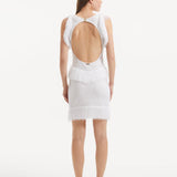 "Detailed view of the Diani White Dress's back, highlighting the delicate gold clasps and low back design."