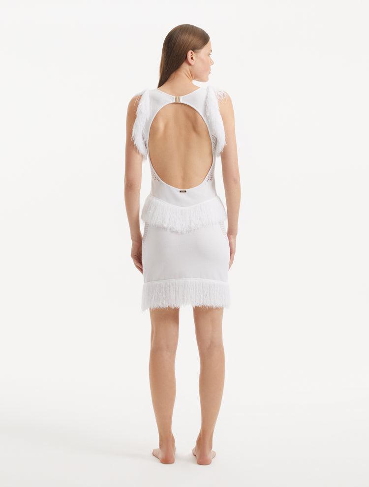 "Detailed view of the Diani White Dress's back, highlighting the delicate gold clasps and low back design."