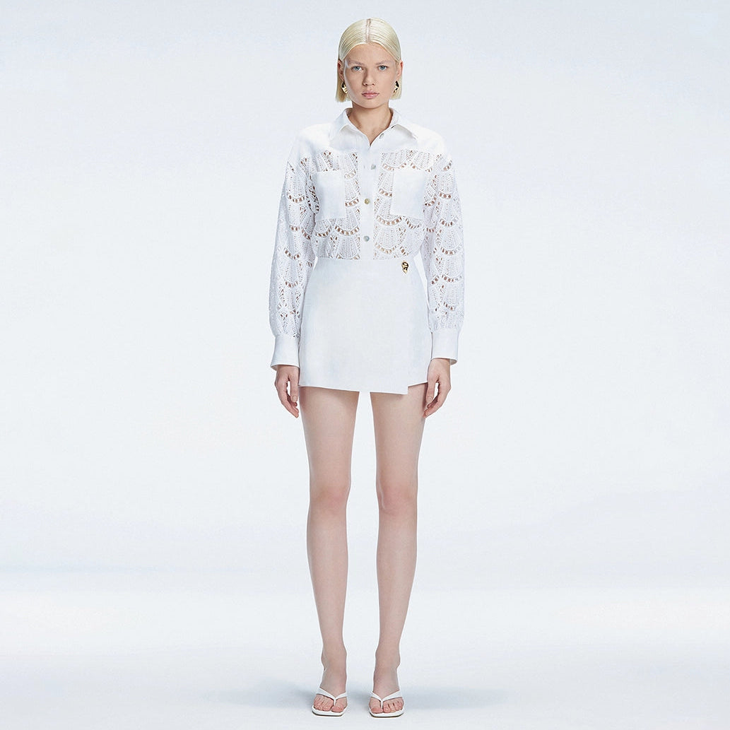 Elise White Linen Mini Skort | Moeva | Skort | Each week unveils new pieces—luxury swimwear, fluid resort silhouettes, and elevated summer-to-evening essentials designed to carry you from coastal escapes to city nights.