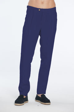 Navy blue pants worn by a person on a white background
