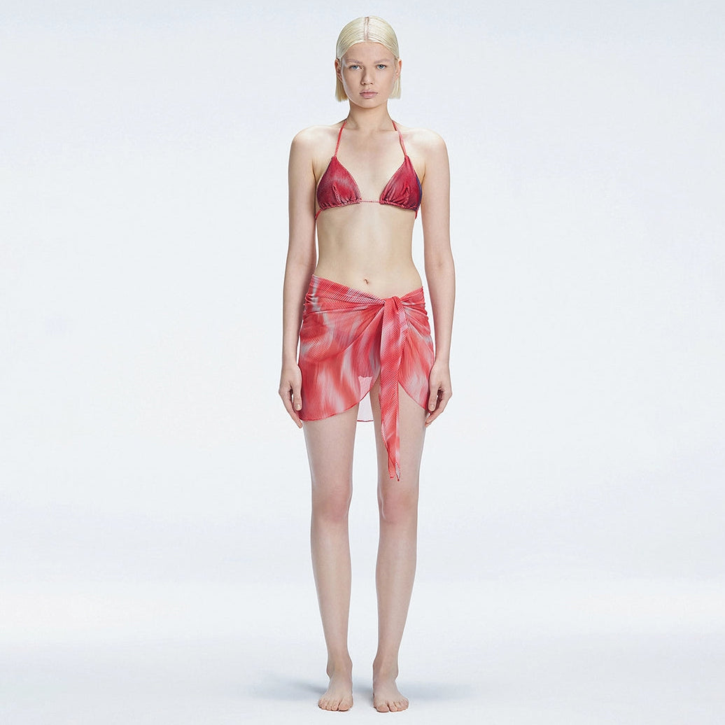 Evita Red Optical Tie Side Sarong | Moeva | Sarong | Each week unveils new pieces—luxury swimwear, fluid resort silhouettes, and elevated summer-to-evening essentials designed to carry you from coastal escapes to city nights.