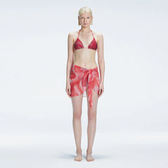 Evita Red Optical Tie Side Sarong | Moeva | Sarong | Each week unveils new pieces—luxury swimwear, fluid resort silhouettes, and elevated summer-to-evening essentials designed to carry you from coastal escapes to city nights.