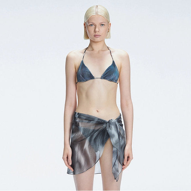 Evita Black Optical Tie Side Sarong | Moeva | Sarong | Each week unveils new pieces—luxury swimwear, fluid resort silhouettes, and elevated summer-to-evening essentials designed to carry you from coastal escapes to city nights.