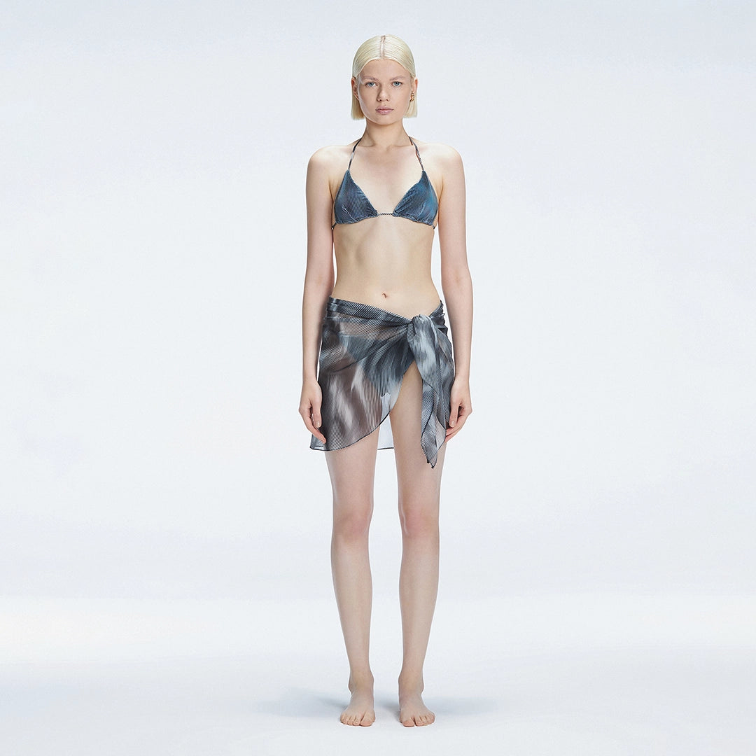 Evita Black Optical Tie Side Sarong | Moeva | Sarong | Each week unveils new pieces—luxury swimwear, fluid resort silhouettes, and elevated summer-to-evening essentials designed to carry you from coastal escapes to city nights.
