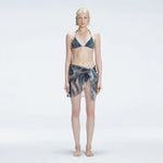 Evita Black Optical Tie Side Sarong | Moeva | Sarong | Each week unveils new pieces—luxury swimwear, fluid resort silhouettes, and elevated summer-to-evening essentials designed to carry you from coastal escapes to city nights.