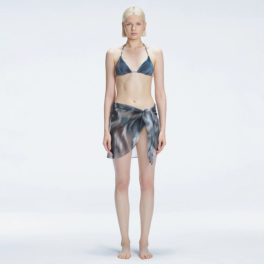 Evita Black Optical Tie Side Sarong | Moeva | Sarong | Each week unveils new pieces—luxury swimwear, fluid resort silhouettes, and elevated summer-to-evening essentials designed to carry you from coastal escapes to city nights.