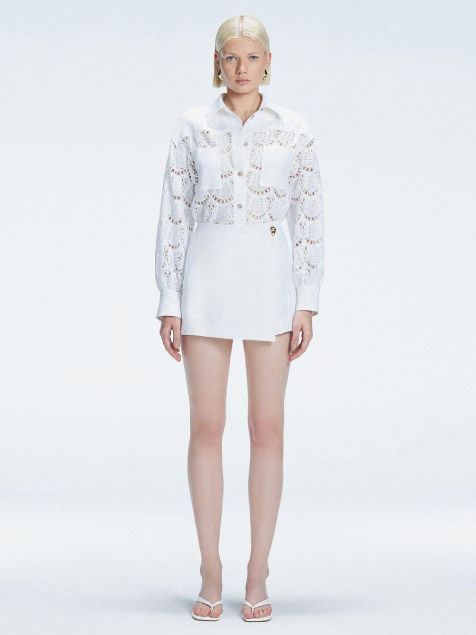 Nola White Long Sleeve Cotton Shirt and Elise White Linen Mini Skort Set | Moeva | Set | Each week unveils new pieces—luxury swimwear, fluid resort silhouettes, and elevated summer-to-evening essentials designed to carry you from coastal escapes to city nights.