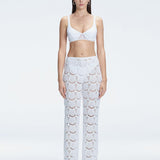 Front view of model wearing Elysia White Wide-Leg Pants with low-rise fit and hidden side zipper.
