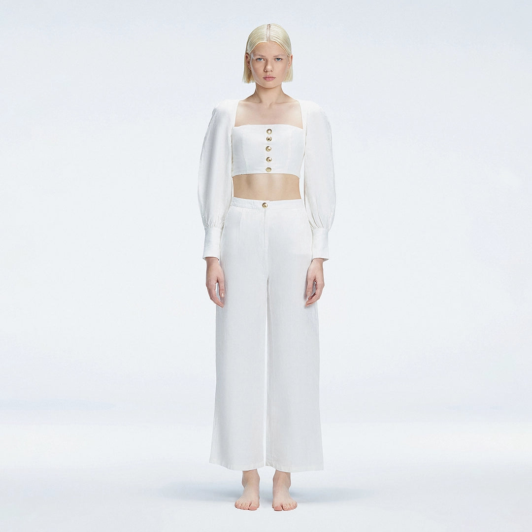 Gemma Square Neck Long Sleeve Top and Valencia High Waist Pants White Set | Moeva | | Each week unveils new pieces—luxury swimwear, fluid resort silhouettes, and elevated summer-to-evening essentials designed to carry you from coastal escapes to city nights.