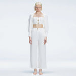 Valencia White Linen High Waist Pant | Moeva | Pants | Each week unveils new pieces—luxury swimwear, fluid resort silhouettes, and elevated summer-to-evening essentials designed to carry you from coastal escapes to city nights.