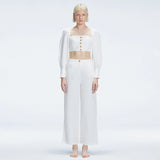 Valencia White Linen High Waist Pant | Moeva | Pants | Each week unveils new pieces—luxury swimwear, fluid resort silhouettes, and elevated summer-to-evening essentials designed to carry you from coastal escapes to city nights.