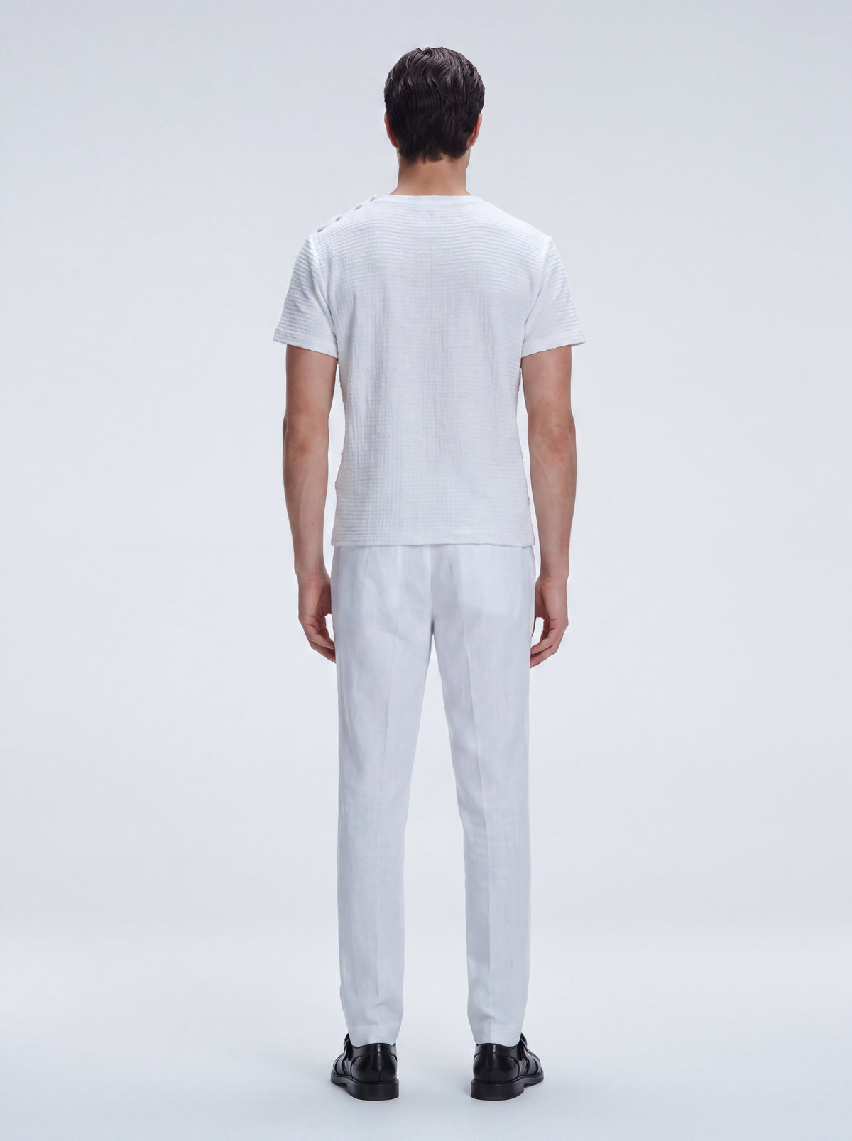 George White Cotton T-Shirt with Button Detail | Moeva | T-Shirt | Each week unveils new pieces—luxury swimwear, fluid resort silhouettes, and elevated summer-to-evening essentials designed to carry you from coastal escapes to city nights.