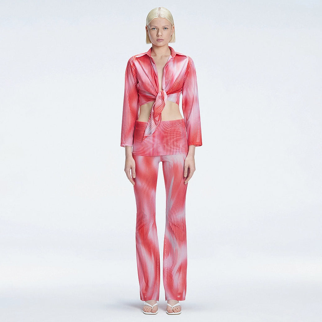 Greta Long Sleeve Tie Front Shirt and Freya High Waist Pants Red Optical Set | Moeva | Set | Each week unveils new pieces—luxury swimwear, fluid resort silhouettes, and elevated summer-to-evening essentials designed to carry you from coastal escapes to city nights.