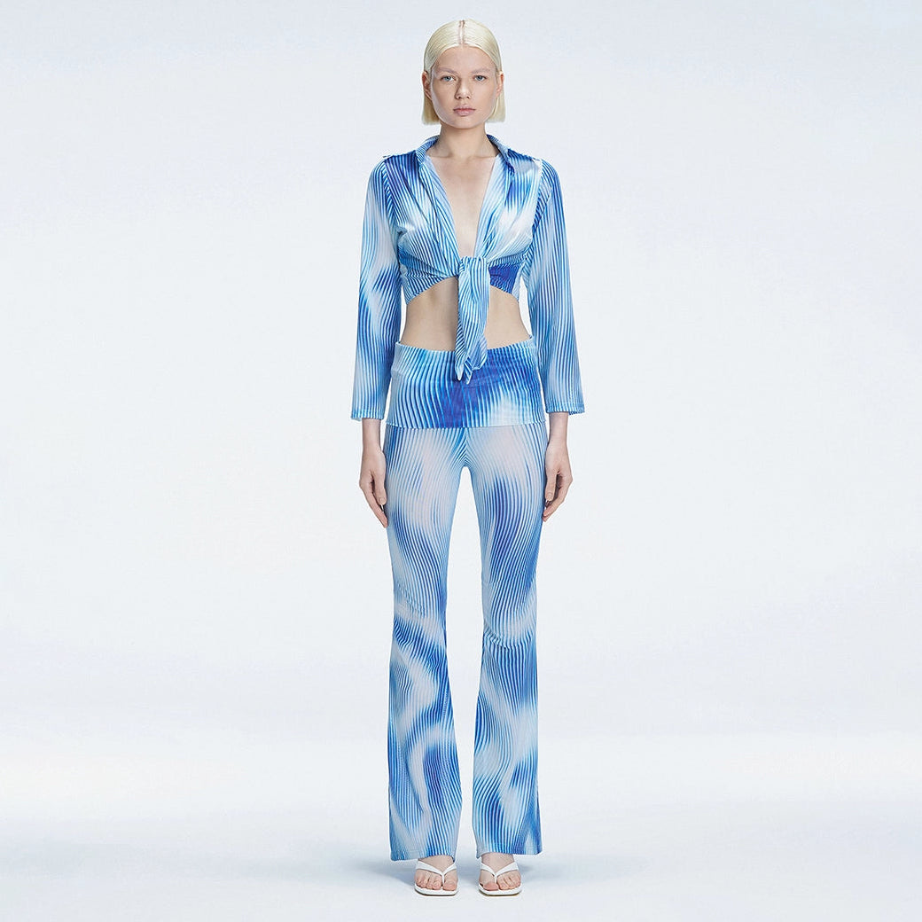 Greta Long Sleeve Tie Front Shirt and Freya High Waist Pants Blue Optical Set | Moeva | Set | Each week unveils new pieces—luxury swimwear, fluid resort silhouettes, and elevated summer-to-evening essentials designed to carry you from coastal escapes to city nights.