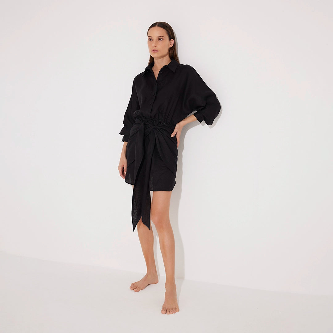 Guadalupe Black Linen Shirt Dress with Tie-Front Detail | Moeva | Beachwear Dresses | Each week unveils new pieces—luxury swimwear, fluid resort silhouettes, and elevated summer-to-evening essentials designed to carry you from coastal escapes to city nights.