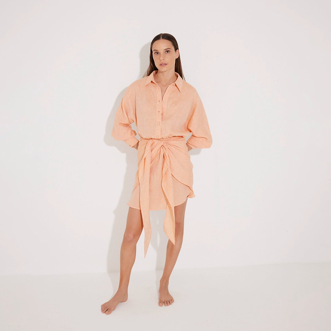 Guadalupe Orange Linen Shirt Dress with Tie-Front Detail | Moeva | Beachwear Dresses | Each week unveils new pieces—luxury swimwear, fluid resort silhouettes, and elevated summer-to-evening essentials designed to carry you from coastal escapes to city nights.