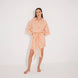 Guadalupe Orange Linen Shirt Dress with Tie-Front Detail | Moeva | Beachwear Dresses | Each week unveils new pieces—luxury swimwear, fluid resort silhouettes, and elevated summer-to-evening essentials designed to carry you from coastal escapes to city nights.
