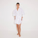 Guadalupe White Linen Shirt Dress with Tie-Front Detail | Moeva | Beachwear Dresses | Each week unveils new pieces—luxury swimwear, fluid resort silhouettes, and elevated summer-to-evening essentials designed to carry you from coastal escapes to city nights.