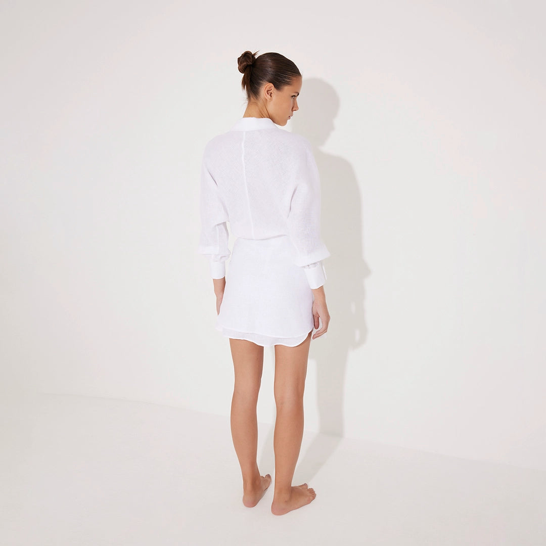 Guadalupe White Linen Shirt Dress with Tie-Front Detail | Moeva | Beachwear Dresses | Each week unveils new pieces—luxury swimwear, fluid resort silhouettes, and elevated summer-to-evening essentials designed to carry you from coastal escapes to city nights.
