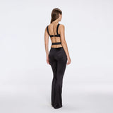 Gwyneth High-Waist with Gold Detail Satin Flare Black Pants | Moeva | Women Beachwear Pants | Each week unveils new pieces—luxury swimwear, fluid resort silhouettes, and elevated summer-to-evening essentials designed to carry you from coastal escapes to city nights.
