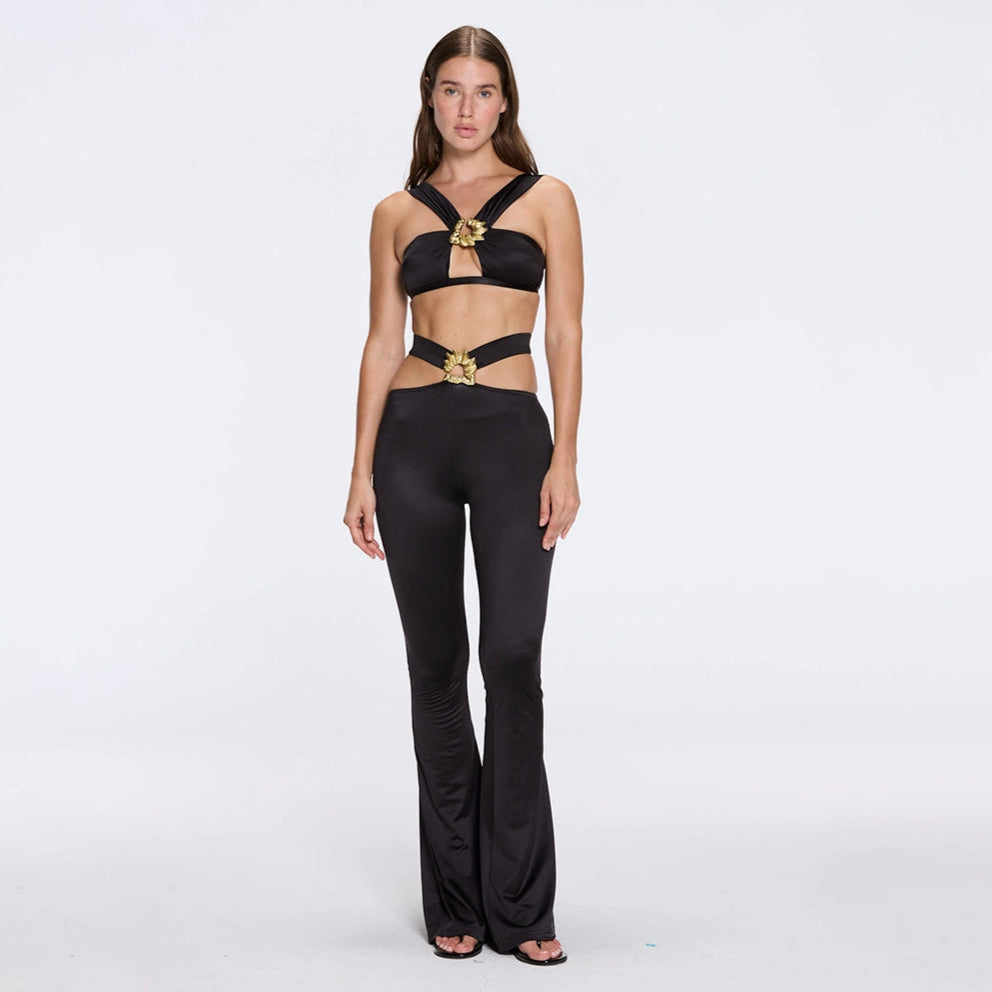 Gwyneth High-Waist with Gold Detail Satin Flare Black Pants | Moeva | Women Beachwear Pants | Each week unveils new pieces—luxury swimwear, fluid resort silhouettes, and elevated summer-to-evening essentials designed to carry you from coastal escapes to city nights.