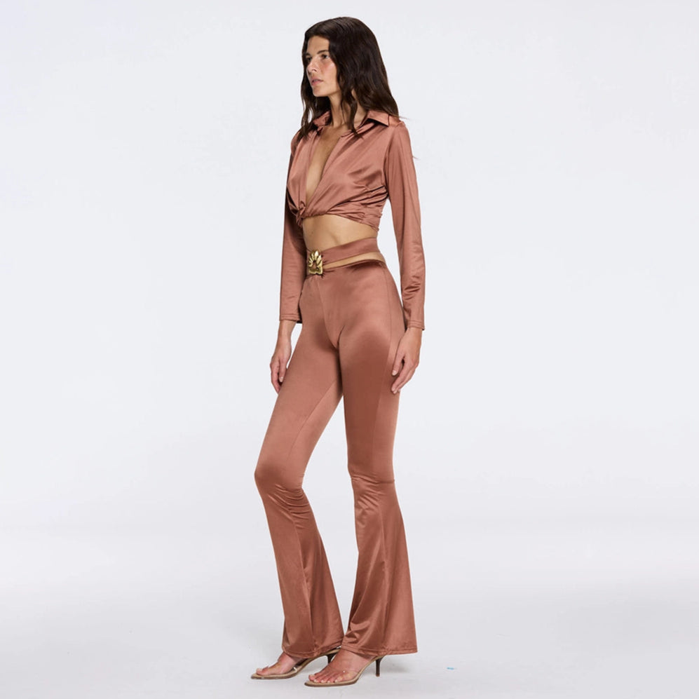 Gwyneth High-Waist with Gold Detail Satin Flare Brown Pants | Moeva | Women Beachwear Pants | Each week unveils new pieces—luxury swimwear, fluid resort silhouettes, and elevated summer-to-evening essentials designed to carry you from coastal escapes to city nights.