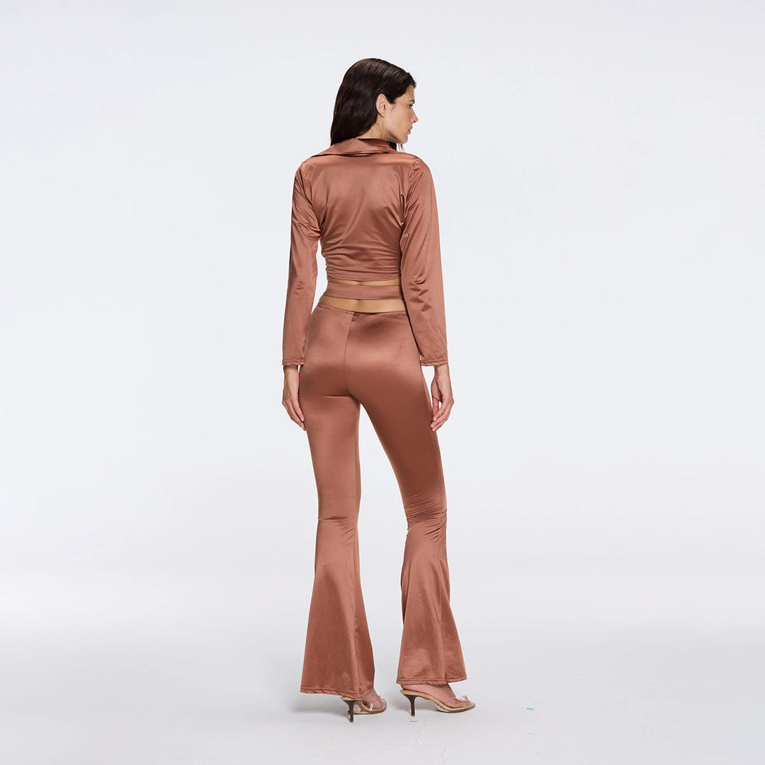 Gwyneth High-Waist with Gold Detail Satin Flare Brown Pants | Moeva | Women Beachwear Pants | Each week unveils new pieces—luxury swimwear, fluid resort silhouettes, and elevated summer-to-evening essentials designed to carry you from coastal escapes to city nights.