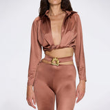 Gwyneth High-Waist with Gold Detail Satin Flare Brown Pants | Moeva | Women Beachwear Pants | Each week unveils new pieces—luxury swimwear, fluid resort silhouettes, and elevated summer-to-evening essentials designed to carry you from coastal escapes to city nights.
