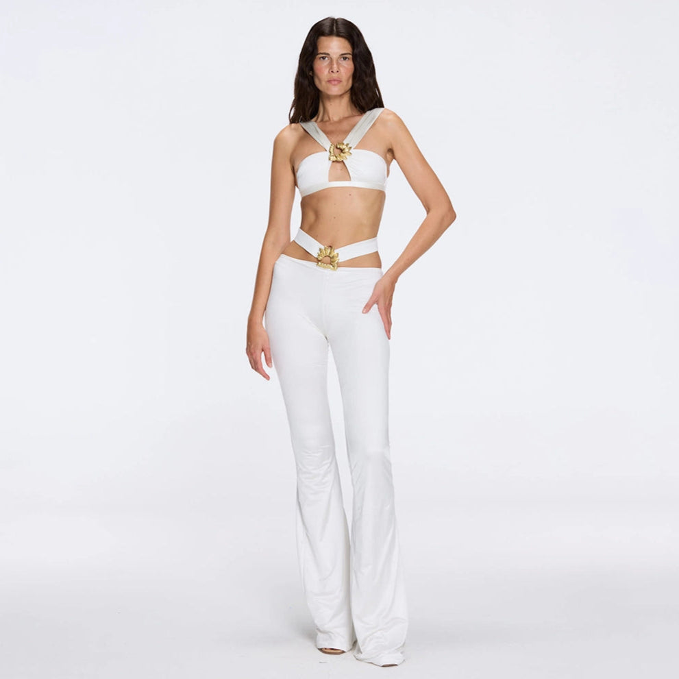 Gwyneth High-Waist with Gold Detail Satin Flare White Pants | Moeva | Women Beachwear Pants | Each week unveils new pieces—luxury swimwear, fluid resort silhouettes, and elevated summer-to-evening essentials designed to carry you from coastal escapes to city nights.