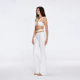 Gwyneth High-Waist with Gold Detail Satin Flare White Pants | Moeva | Women Beachwear Pants | Each week unveils new pieces—luxury swimwear, fluid resort silhouettes, and elevated summer-to-evening essentials designed to carry you from coastal escapes to city nights.