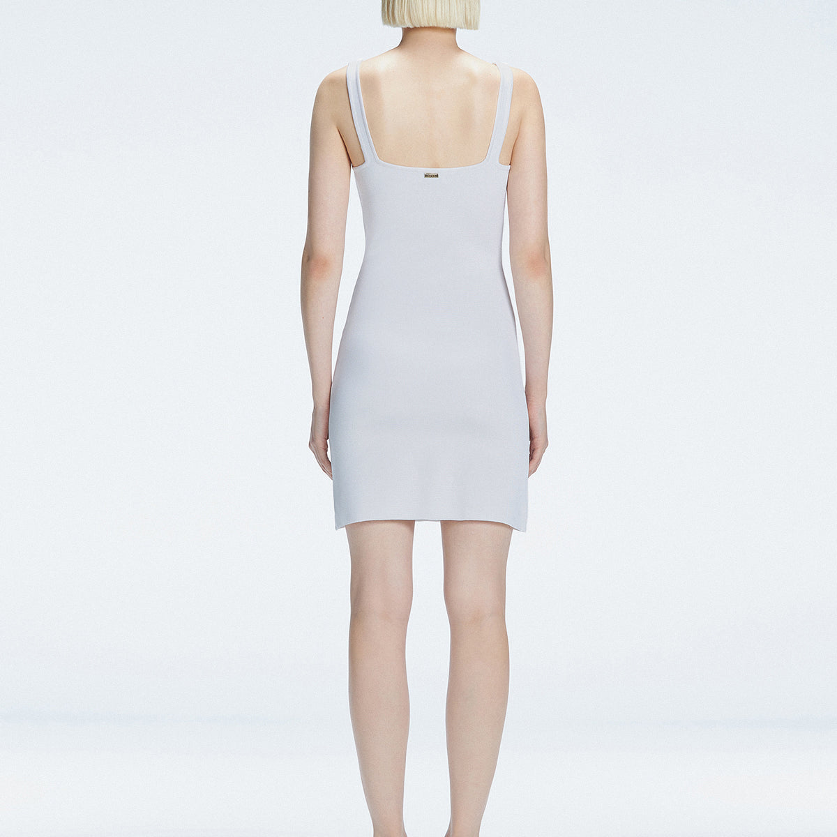 Heather Square Neck Knit Mini Dress Slit Detail | Moeva | Dress | Each week unveils new pieces—luxury swimwear, fluid resort silhouettes, and elevated summer-to-evening essentials designed to carry you from coastal escapes to city nights.