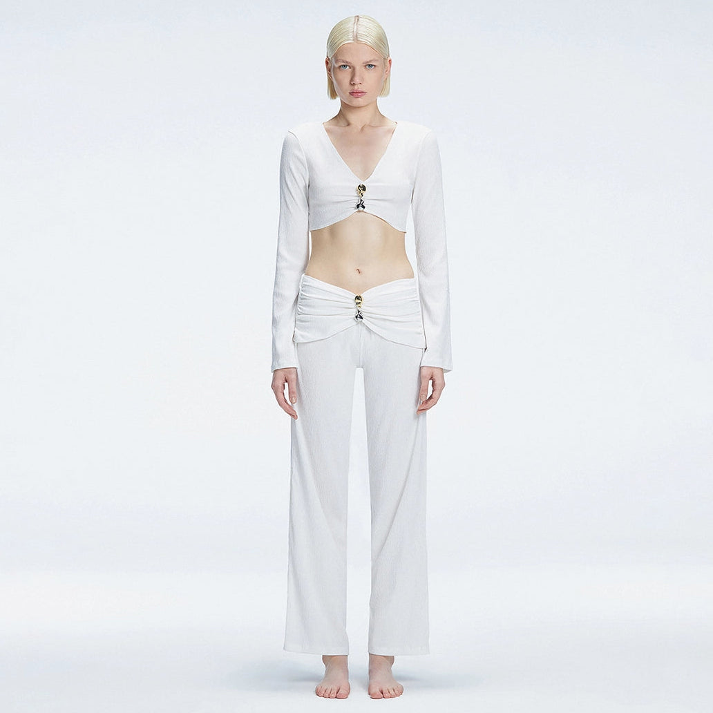 Sirenia Long Sleeve Crop Top and Helena Straight Leg Accessorised Pants White Set | Moeva | Set | Each week unveils new pieces—luxury swimwear, fluid resort silhouettes, and elevated summer-to-evening essentials designed to carry you from coastal escapes to city nights.