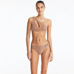 Calix Bronze One Shoulder Bikini Top | Moeva | Bikini Top | Each week unveils new pieces—luxury swimwear, fluid resort silhouettes, and elevated summer-to-evening essentials designed to carry you from coastal escapes to city nights.