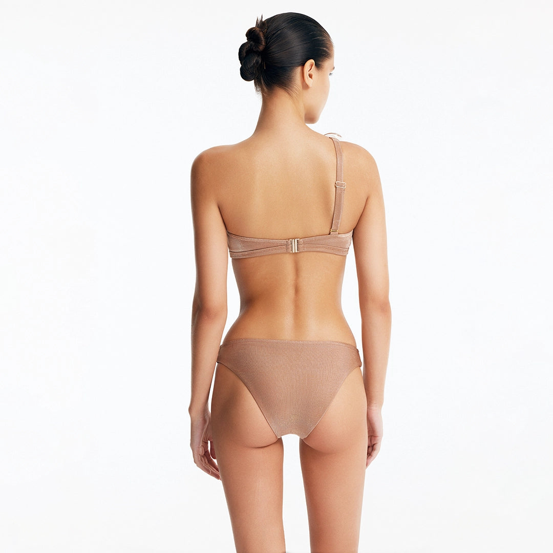 Calix Bronze One Shoulder Bikini Top | Moeva | Bikini Top | Each week unveils new pieces—luxury swimwear, fluid resort silhouettes, and elevated summer-to-evening essentials designed to carry you from coastal escapes to city nights.