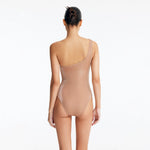 Rowan Bronze One-Shoulder Swimsuit with Hoop Detail | Moeva | Swimsuit | Each week unveils new pieces—luxury swimwear, fluid resort silhouettes, and elevated summer-to-evening essentials designed to carry you from coastal escapes to city nights.